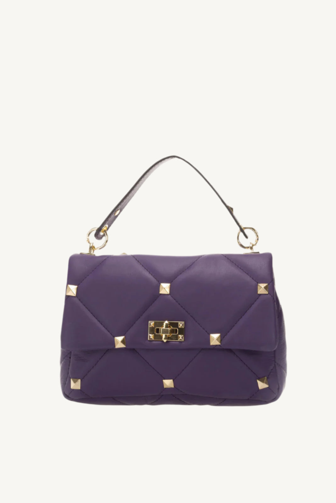 "Quilted full-grain leather bag with stud embellishments – Italian craftsmanship and elegance."