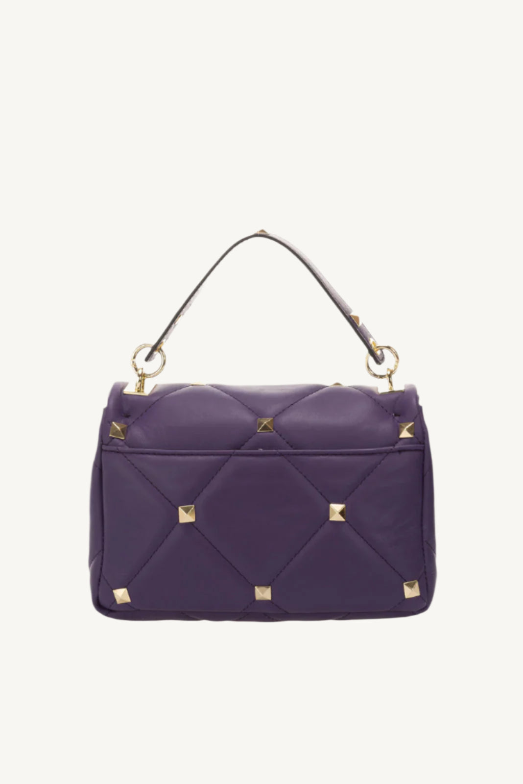 "Quilted full-grain leather bag with stud embellishments – Italian craftsmanship and elegance."