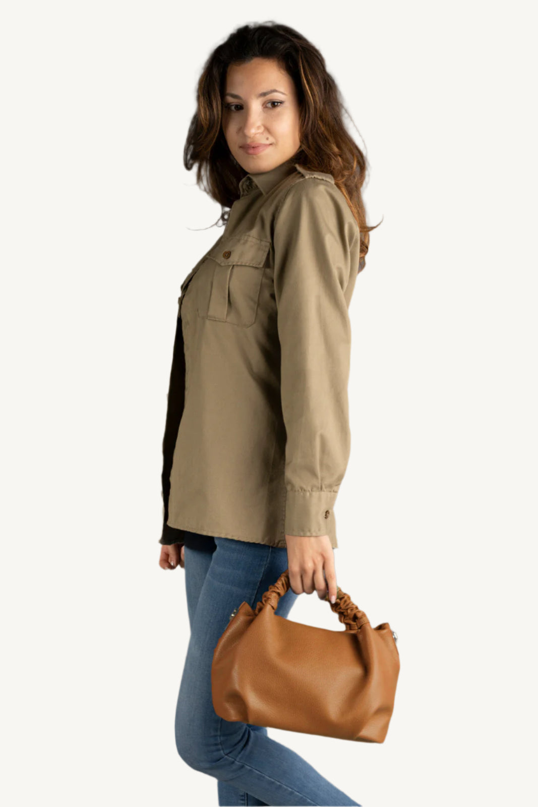 "Elegant women's grain leather handbag with top handles, adjustable strap, zip closure, and organized interior. Made in Italy for timeless style."