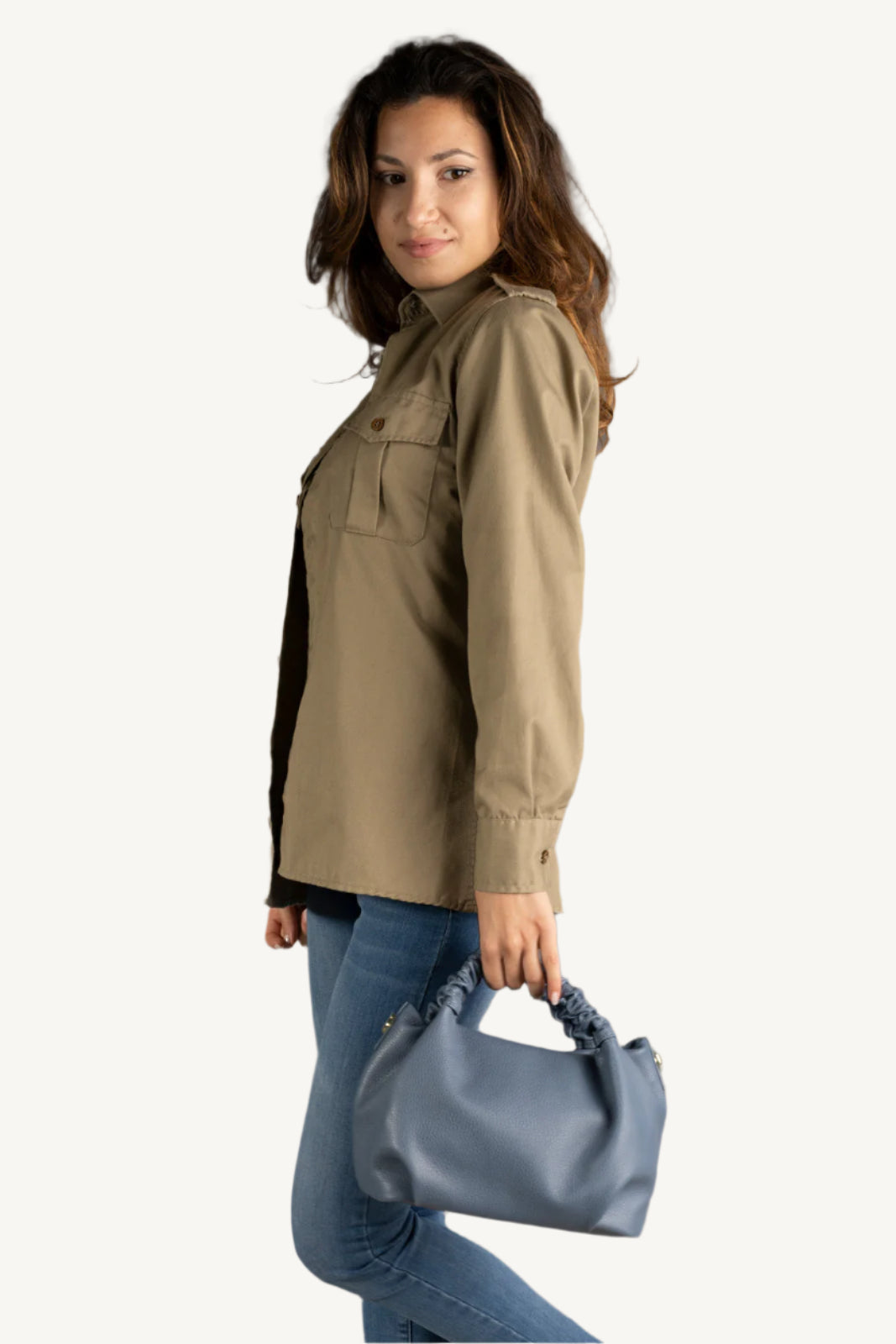 "Women's grain leather handbag with top handles, adjustable strap, zip closure, and spacious interior. Perfect for everyday elegance. Made in Italy."