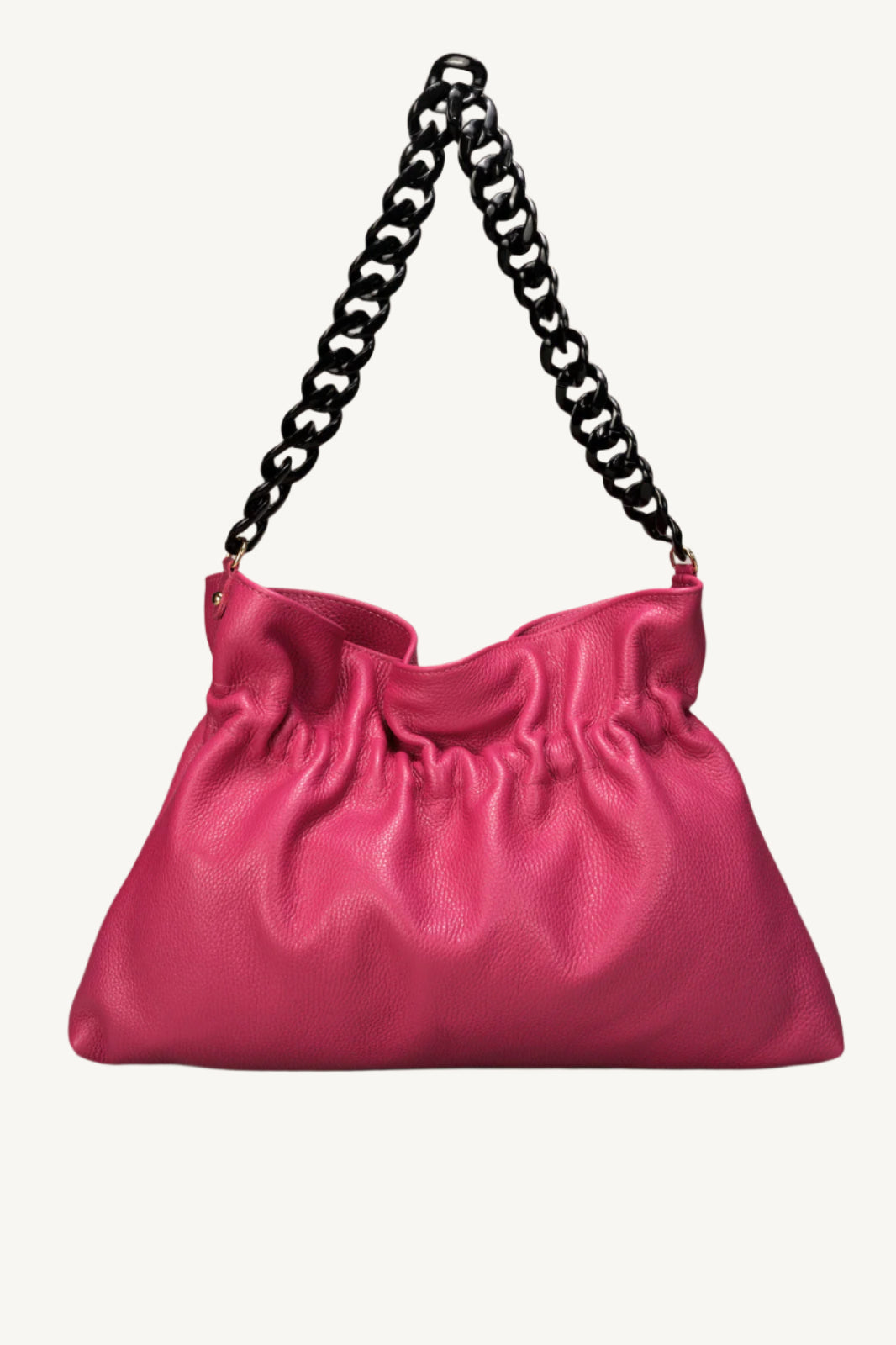 "Soft and slouchy leather top handle shoulder bag with elegant chain strap, zip closure, interior zip pocket, and cellphone pocket. Made in Italy."