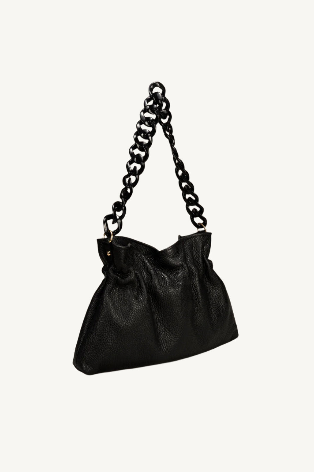 "Soft and slouchy leather shoulder bag with chain handle, zip closure, and interior zip and cellphone pockets. Stylish and functional design for every woman."