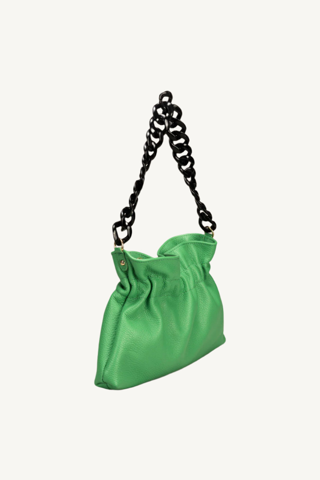 "Soft leather top handle or shoulder bag with chain strap, zip closure, and interior pockets. Elegant, slouchy, and functional design."