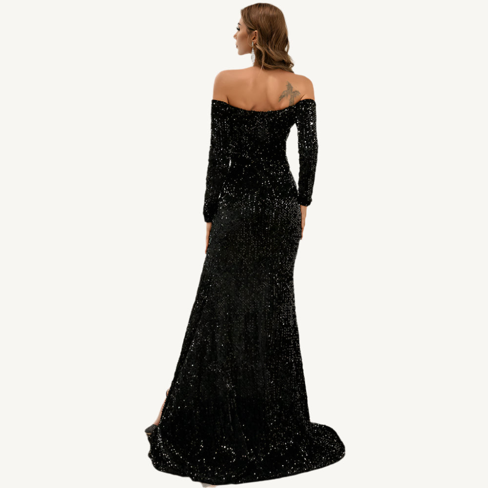 Blair Off Shoulder Sequin Gown, a luxurious evening dress with off-shoulder design, adorned with shimmering sequins. This stunning gown offers a glamorous and sophisticated look, perfect for formal events, galas, or red carpet occasions.