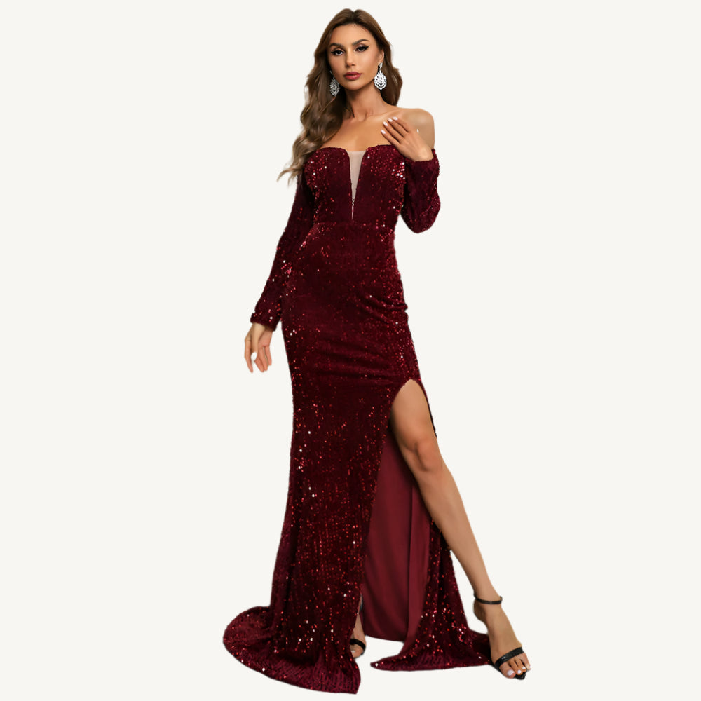 Blair Off Shoulder Sequin Gown, a luxurious evening dress with off-shoulder design, adorned with shimmering sequins. This stunning gown offers a glamorous and sophisticated look, perfect for formal events, galas, or red carpet occasions.